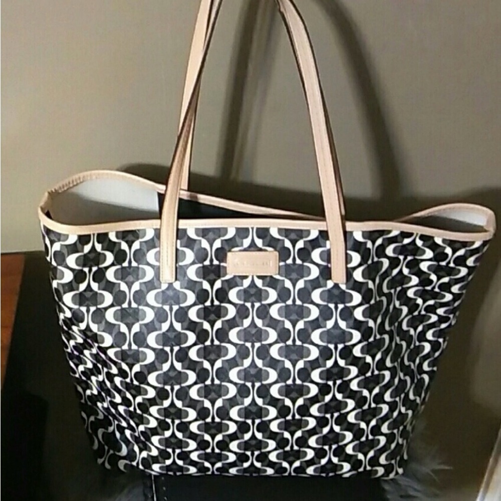 Coach Tan and black logo print . Authentic 
 not returnable. Beautiful
